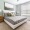 a bedroom with lots of natural lighting