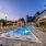 pool with reclining seats and modern stonework