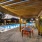 pool area with reclining seats and landscaping