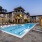 pool with reclining seats and modern stonework