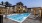 pool with reclining seats and modern stonework