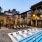 pool with reclining seats and modern stonework